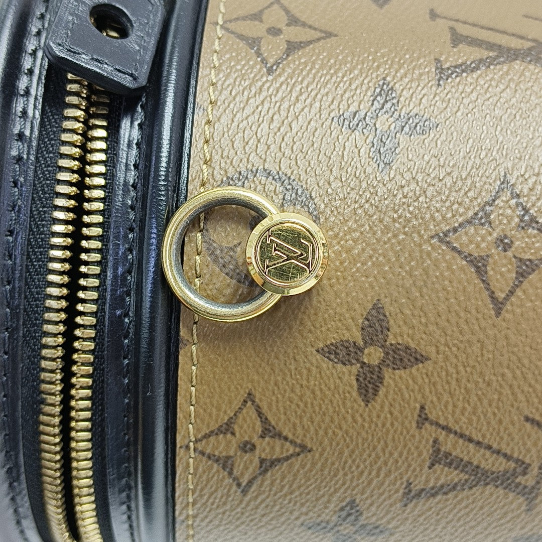 CANNES PM Monogram Coated Canvas Brown
