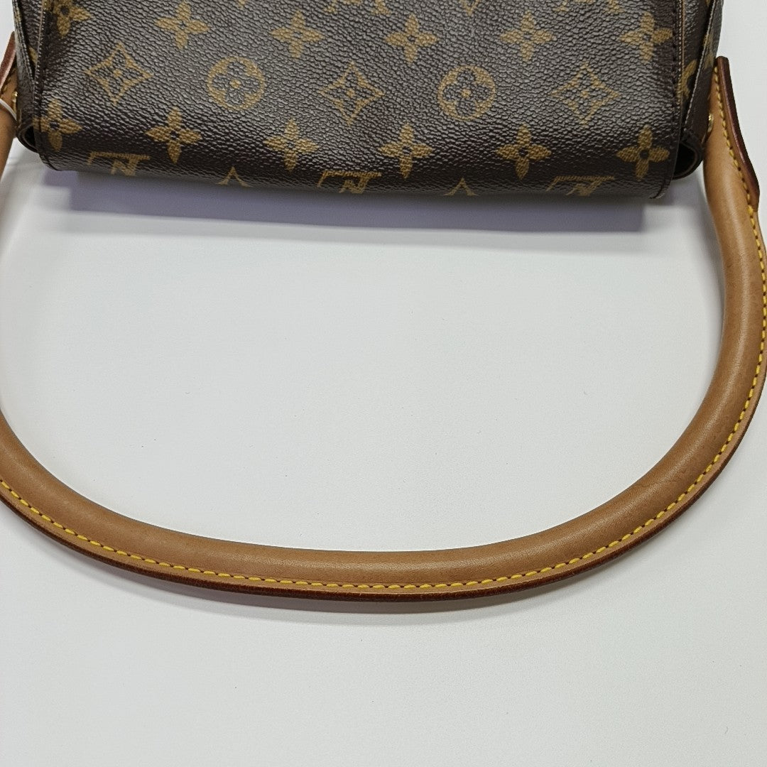 LOOPING PM Monogram Coated Canvas Brown