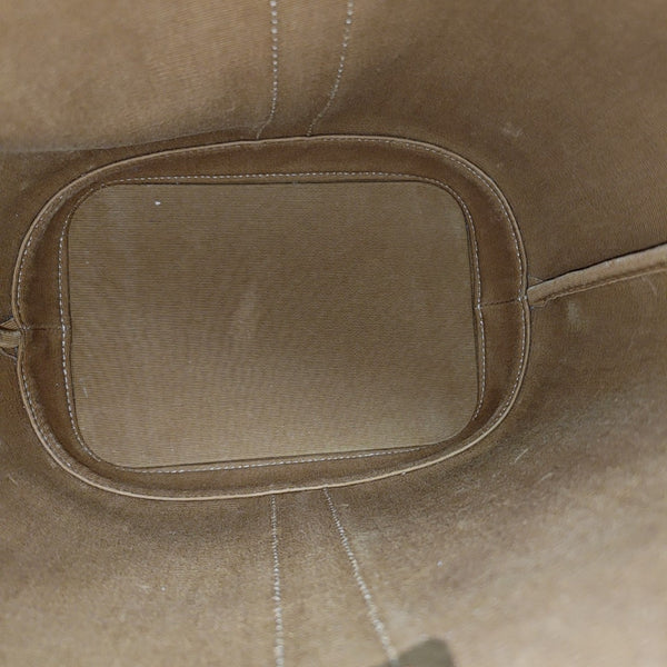 Authenticated pre-owned  TRIOMPHE CANVAS Small Coated Canvas Beige - Bucket Bag at Looply