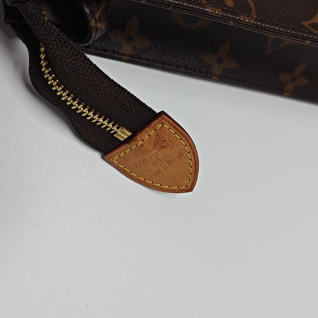 TOILET POCKET 26 Monogram Coated Canvas Brown