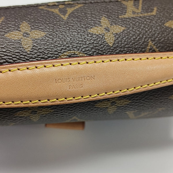 MÉTIS EAST WEST Monogram Coated Canvas Brown