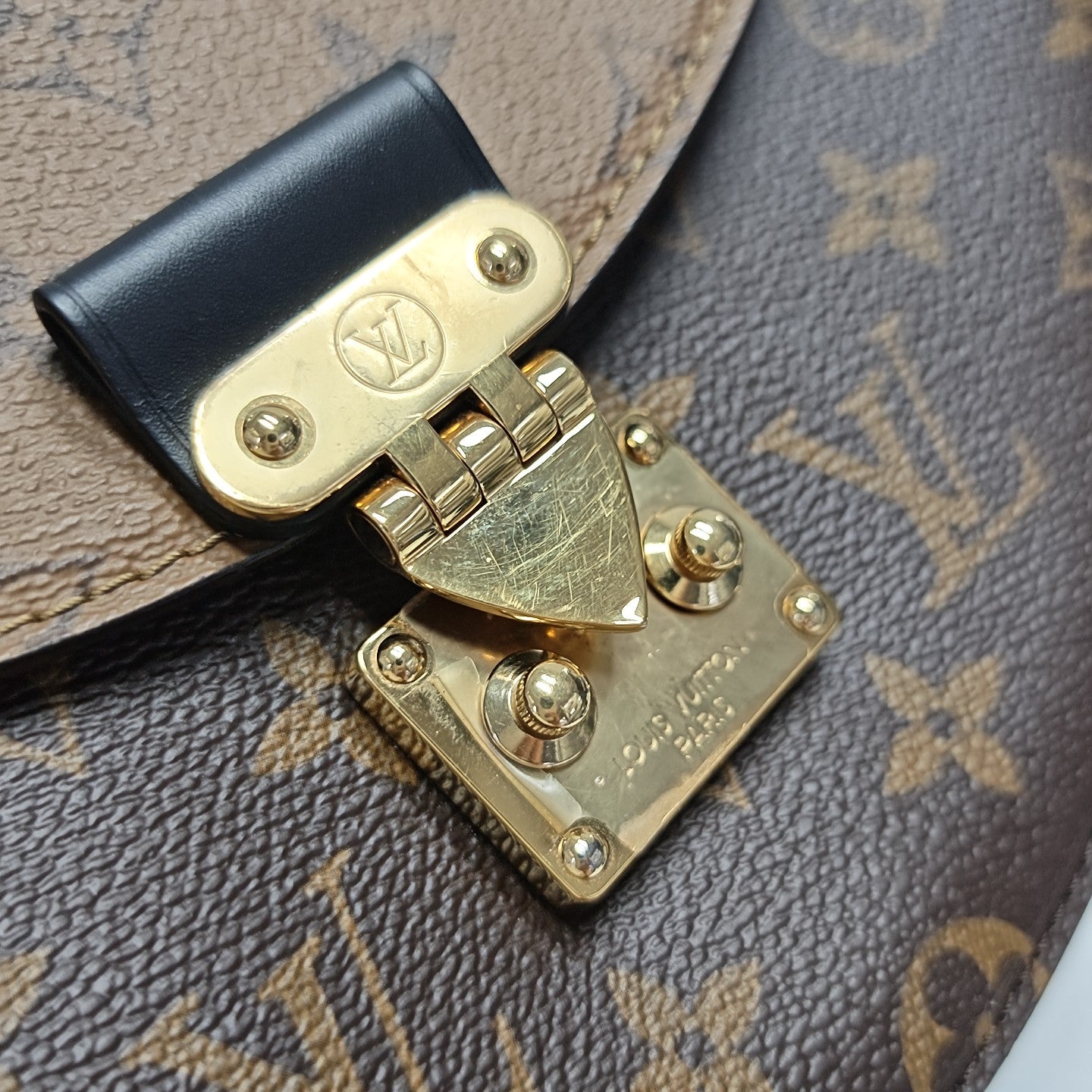 EDEN Monogram Coated Canvas Brown