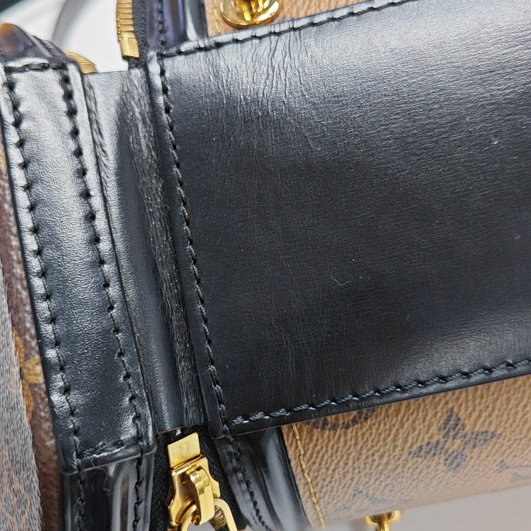 CANNES PM Monogram Coated Canvas Brown