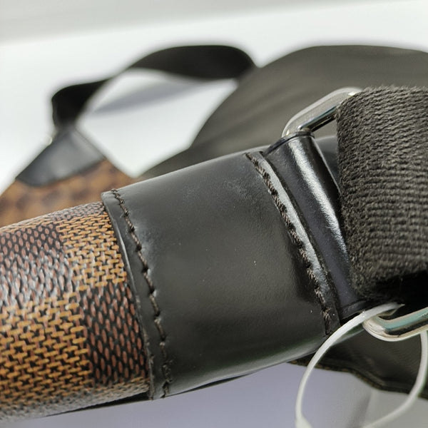 DISTRICT MM Damier Ebene Coated Canvas Brown