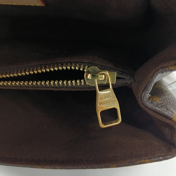 MÉTIS EAST WEST Monogram Coated Canvas Brown