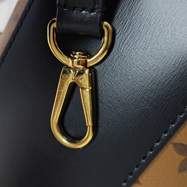 CANNES PM Monogram Coated Canvas Brown