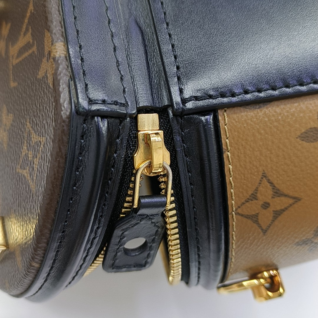 CANNES PM Monogram Coated Canvas Brown
