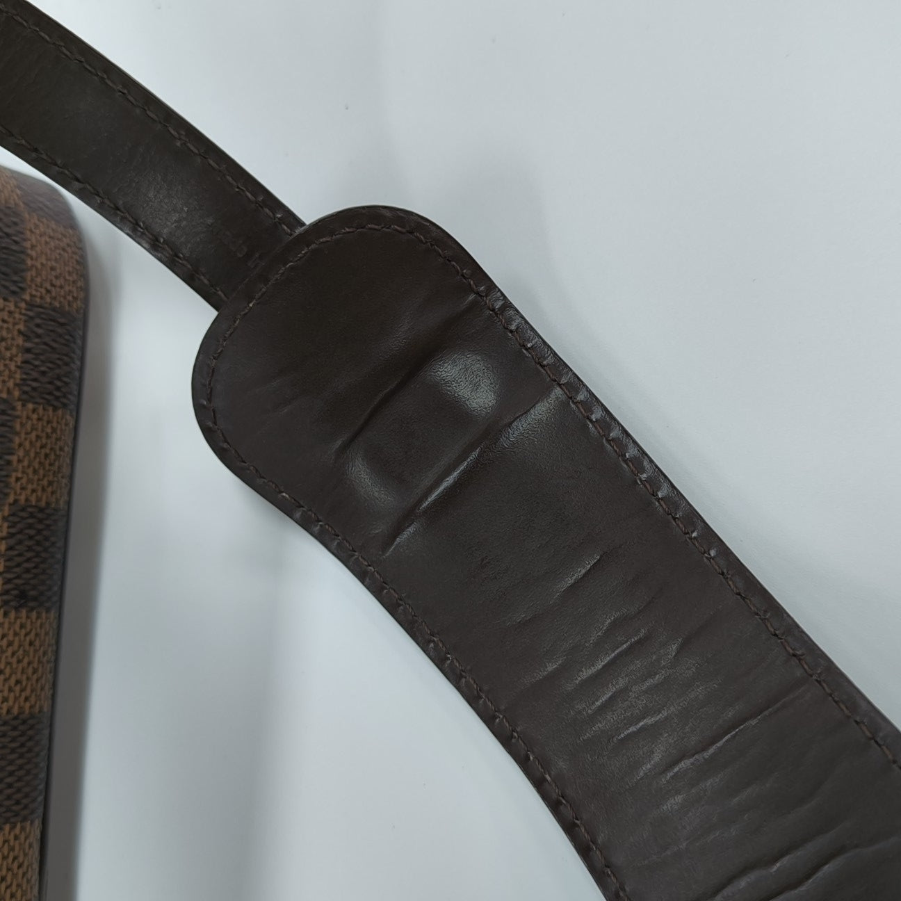 RAVELLO GM Damier Ebene Coated Canvas Brown