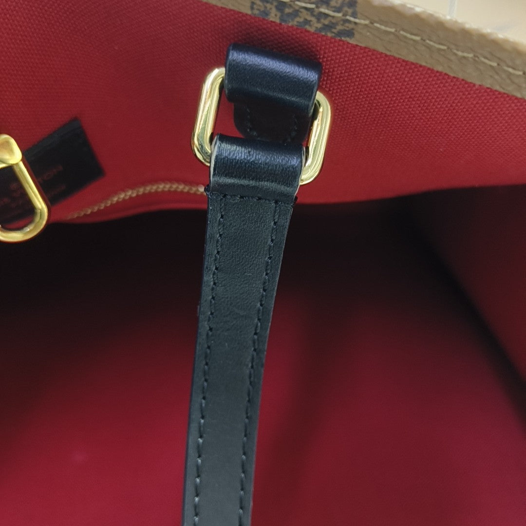 ONTHEGO GM Monogram Coated Canvas Brown