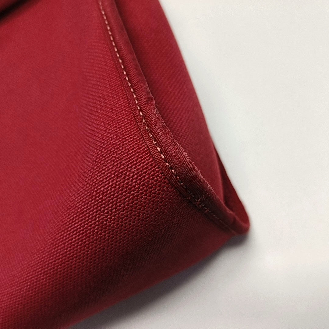 Authenticated pre-owned  Herbag 31 Canvas Red - Shoulder Bag at Looply