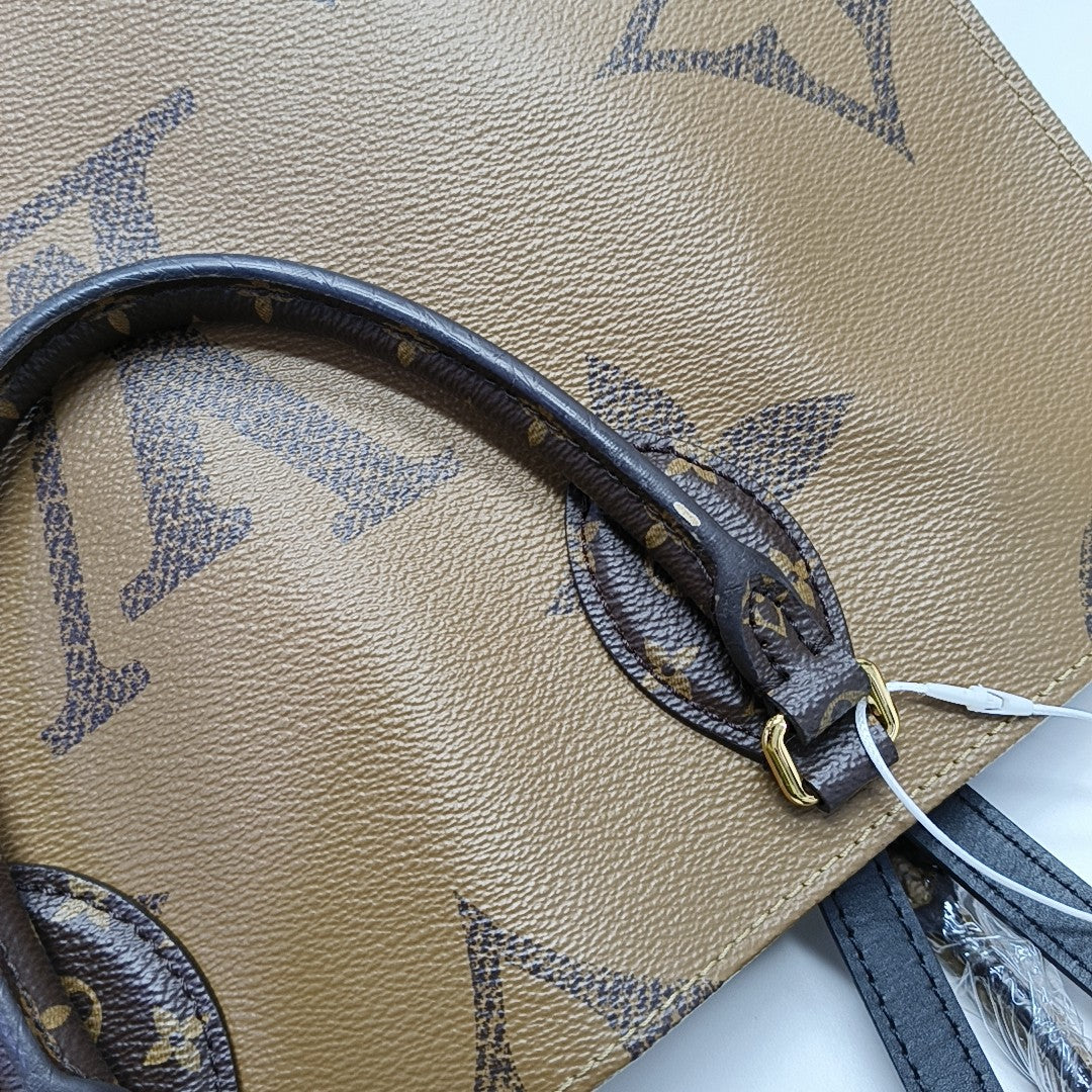 ONTHEGO MM Monogram Coated Canvas Brown