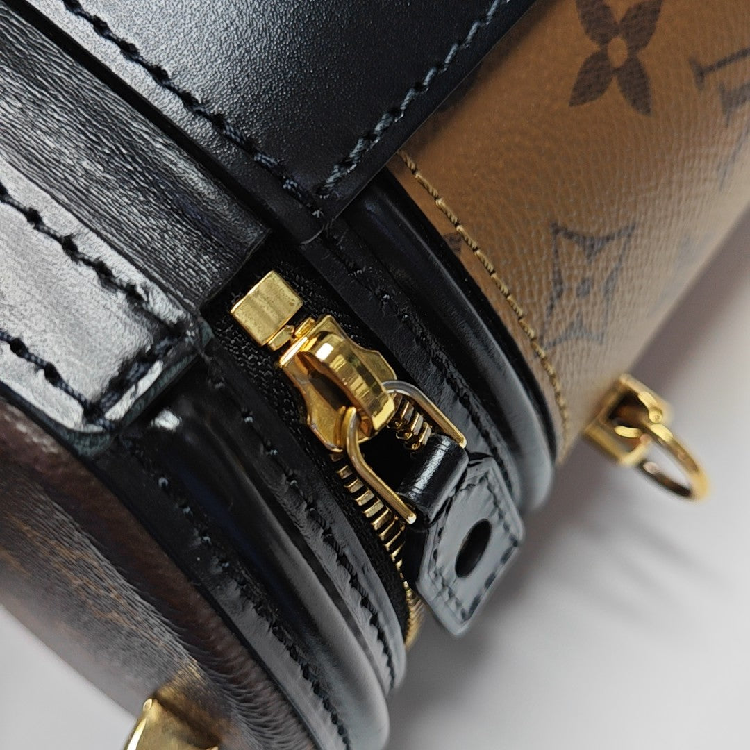 CANNES PM Monogram Coated Canvas Brown