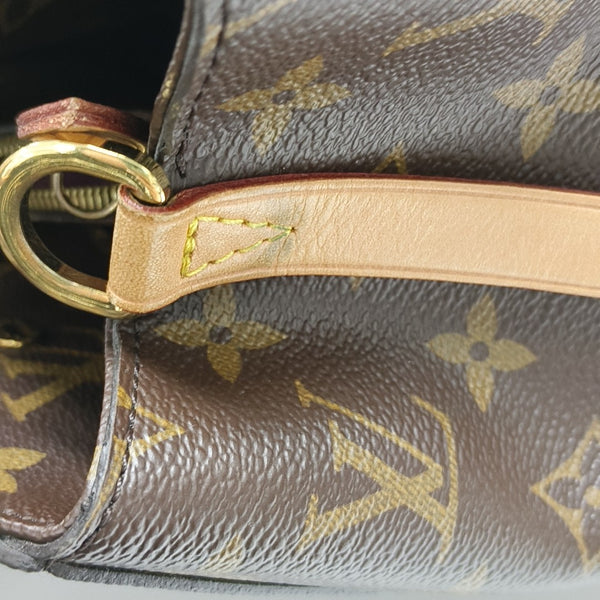 MONTAIGNE GM Monogram Coated Canvas Brown