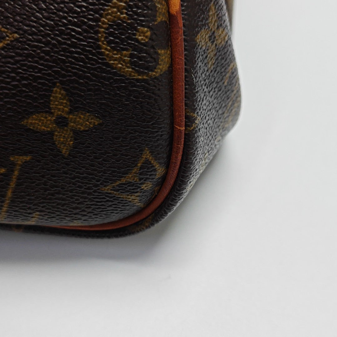 SPEEDY 30 Monogram Coated Canvas Brown