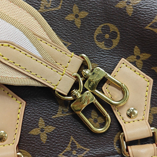 SPEEDY 20 Monogram Coated Canvas Brown