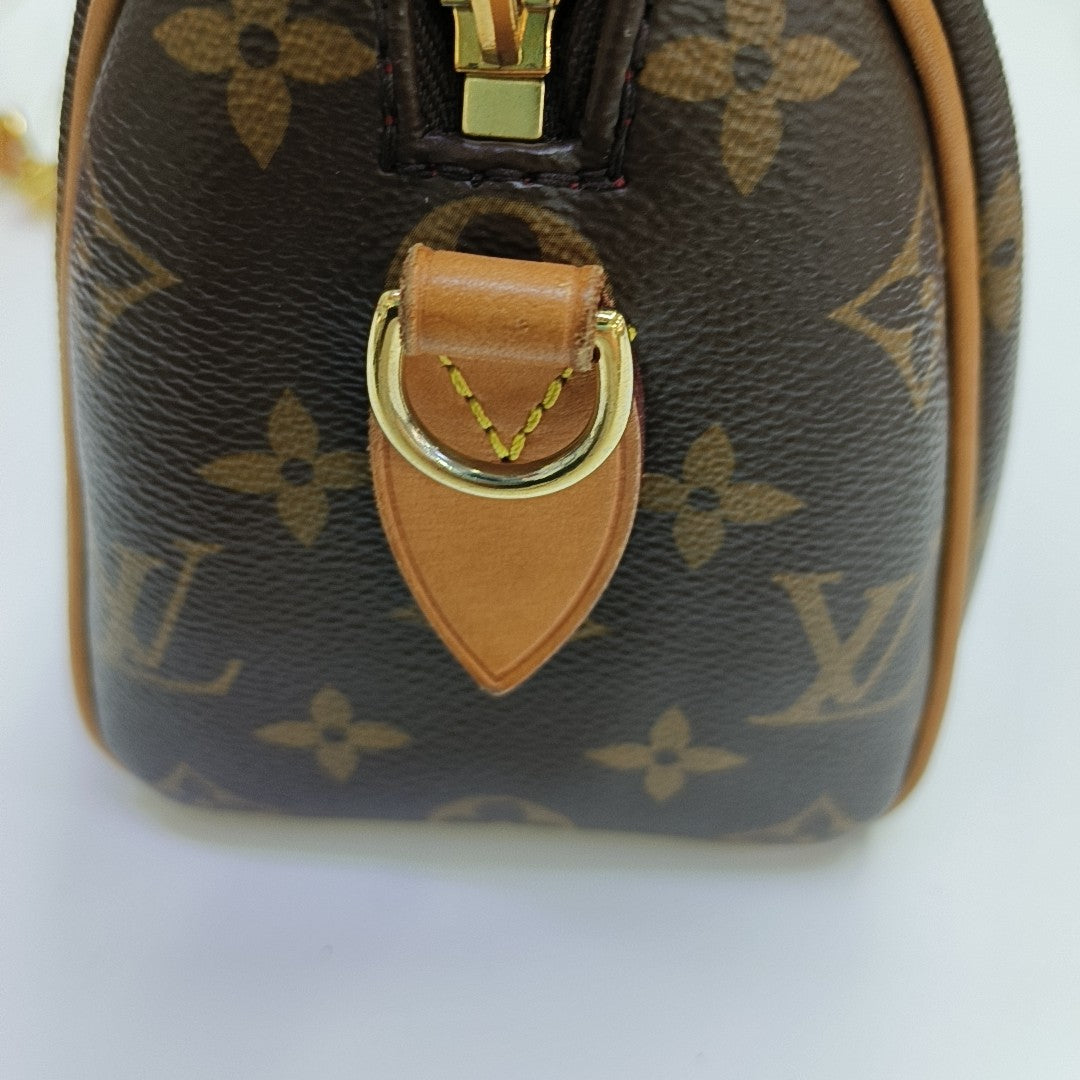 SPEEDY 20 Monogram Coated Canvas Brown