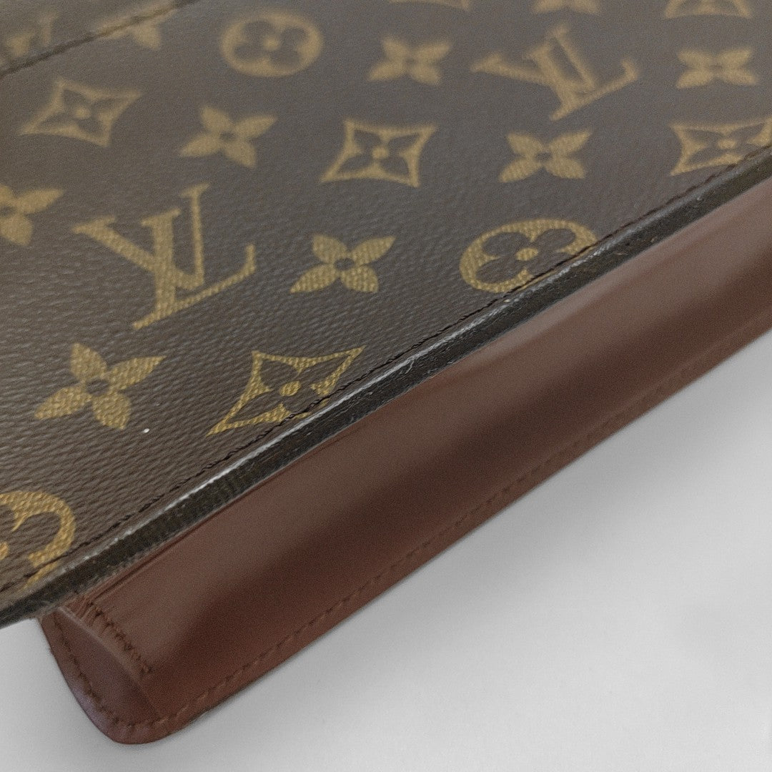 Monogram Coated Canvas Clutch Brown