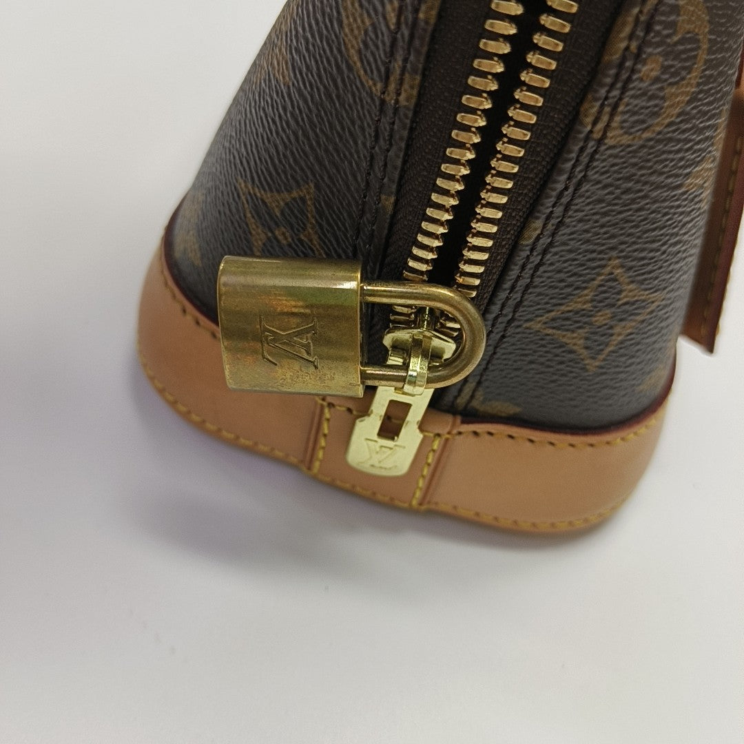ALMA BB Monogram Coated Canvas Brown