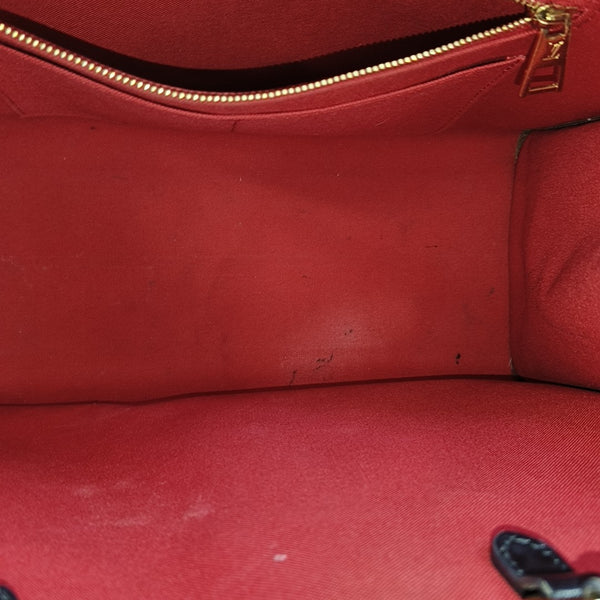 ONTHEGO MM Monogram Coated Canvas Brown