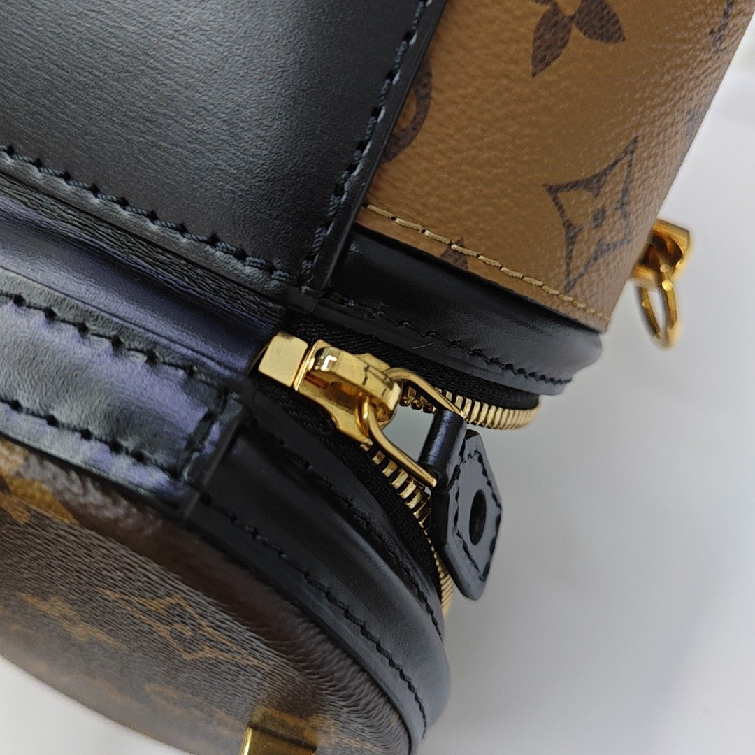 CANNES PM Monogram Coated Canvas Brown