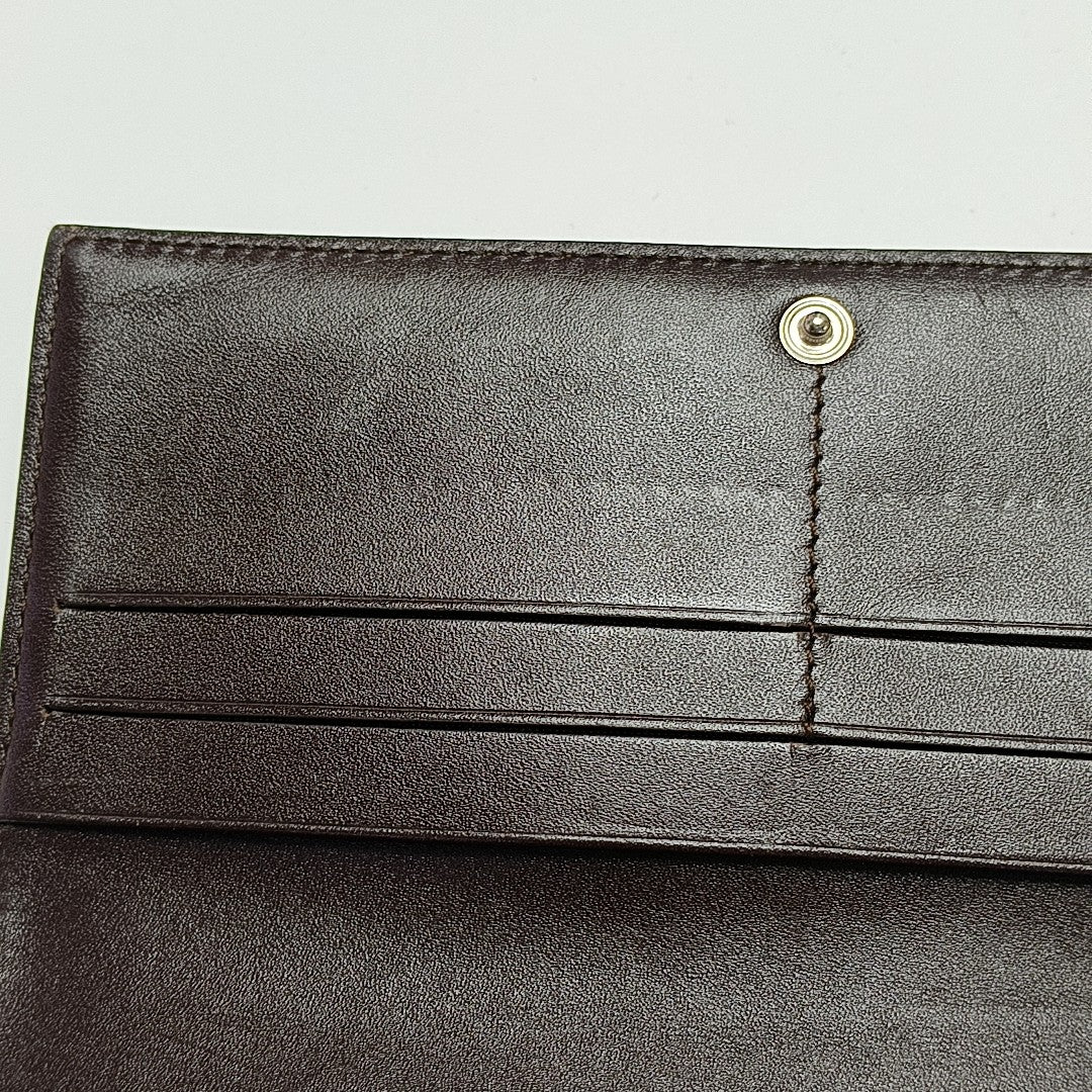 Monogram Leather Clutch Gray