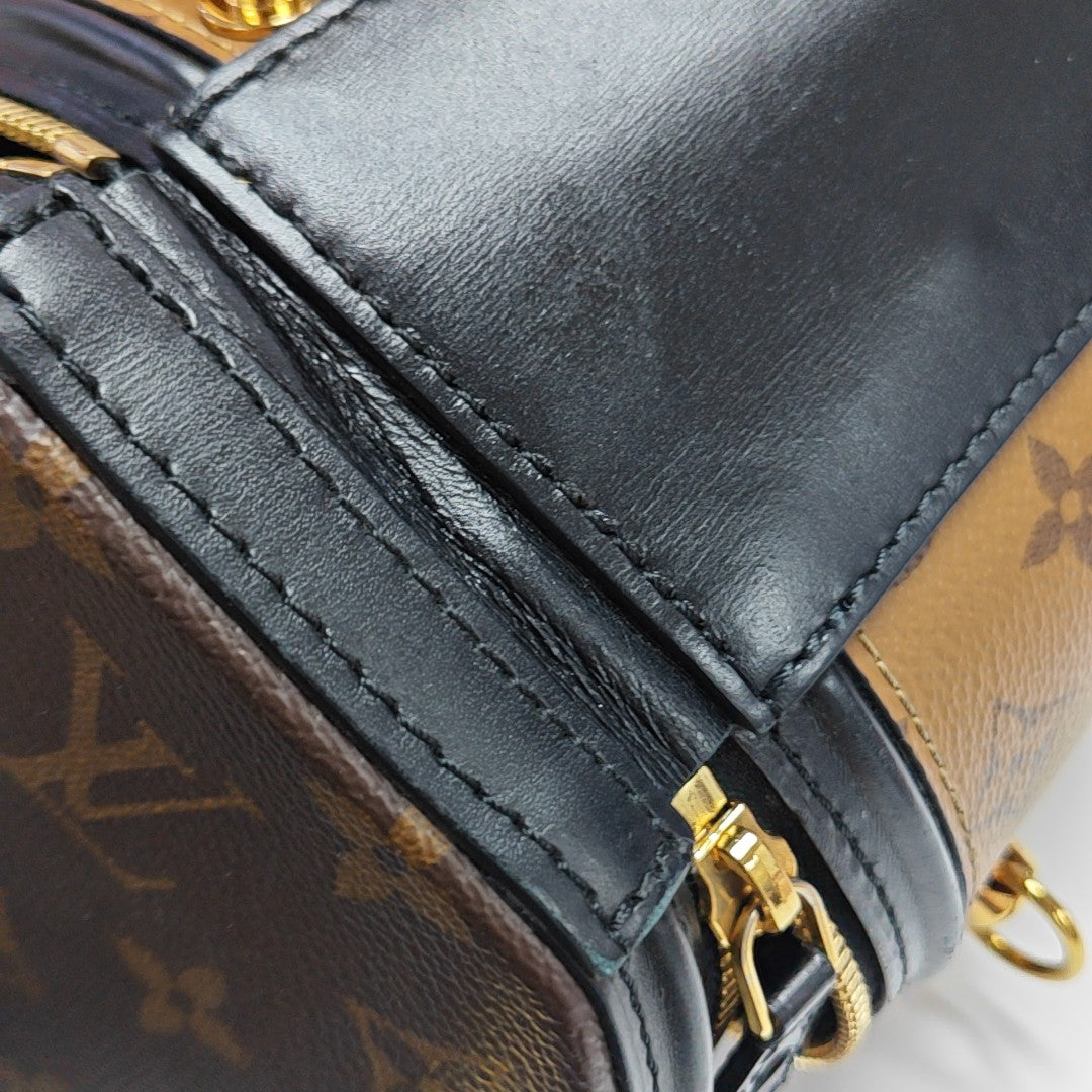 CANNES PM Monogram Coated Canvas Brown