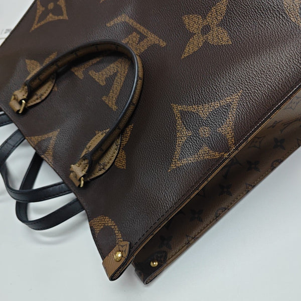 ONTHEGO MM Monogram Coated Canvas Brown