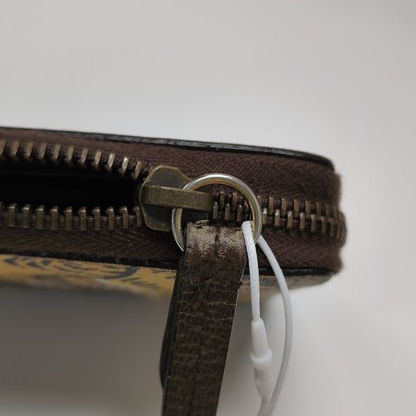 Monogram Coated Canvas Wallet Brown