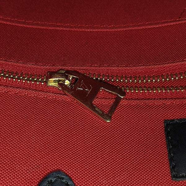 ONTHEGO MM Monogram Coated Canvas Brown