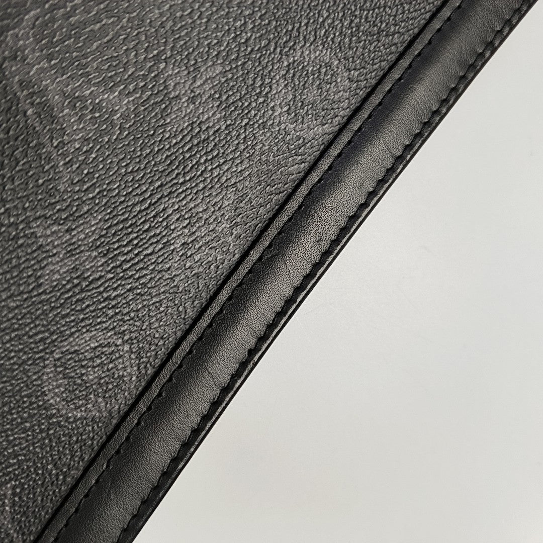 Pochette Voyag MM Monogram Coated Canvas Black