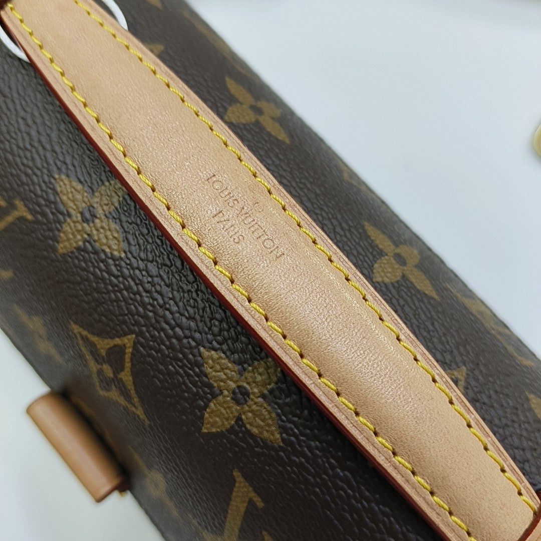 MÉTIS EAST WEST Monogram Coated Canvas Brown