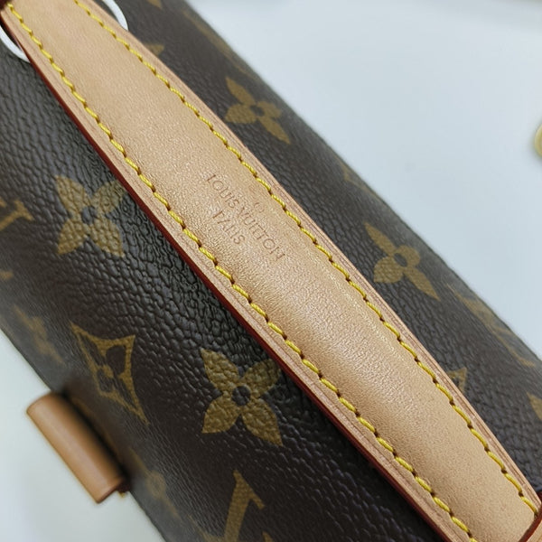 MÉTIS EAST WEST Monogram Coated Canvas Brown