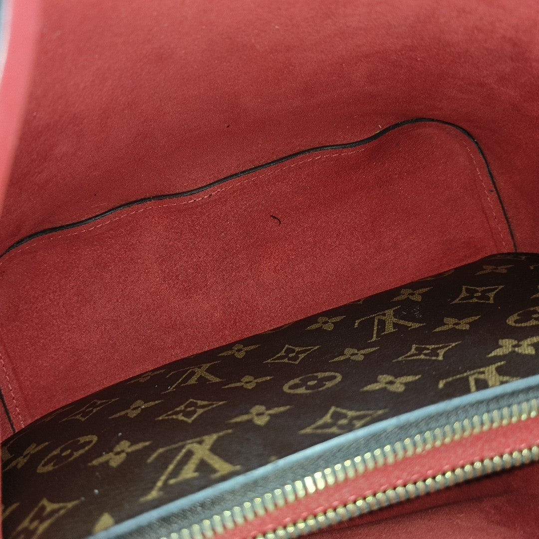 NÉONOÉ MM Monogram Coated Canvas Brown