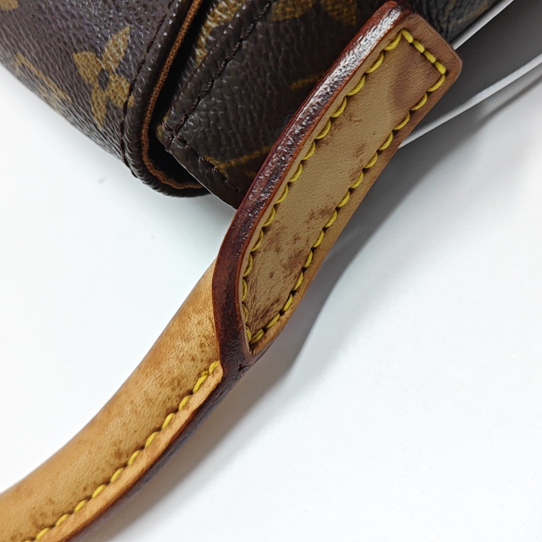 LOOPING PM Monogram Coated Canvas Brown