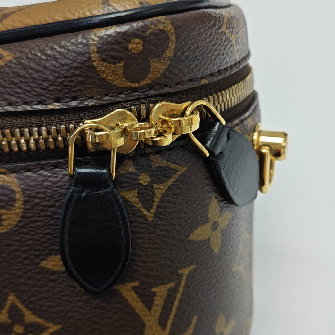 PHONE BOX Monogram Coated Canvas Brown