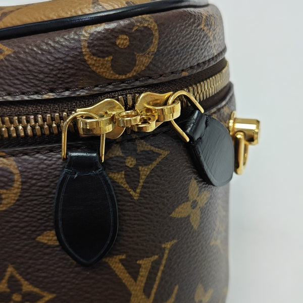 PHONE BOX Monogram Coated Canvas Brown