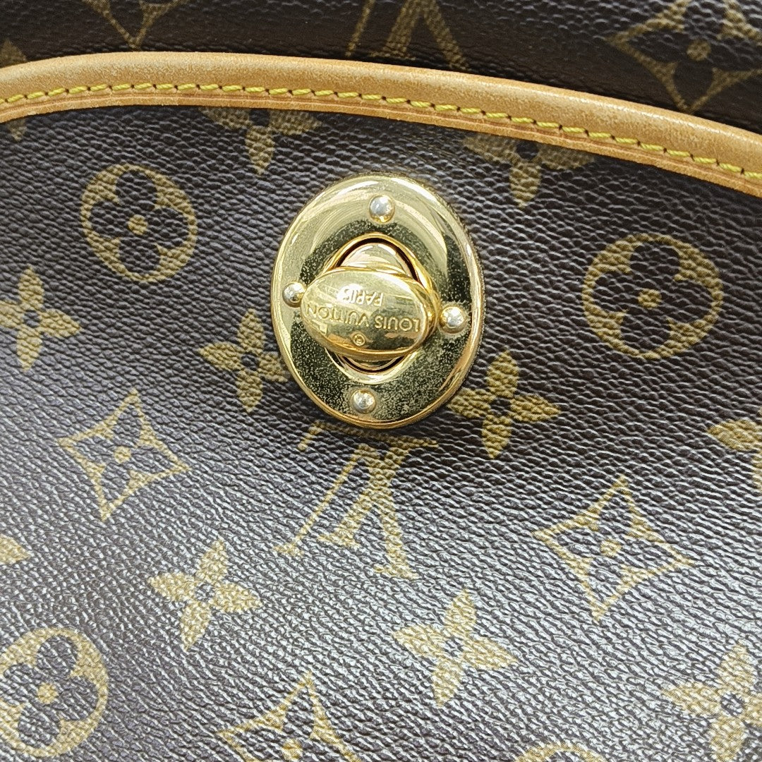 TULUM PM Monogram Coated Canvas Brown