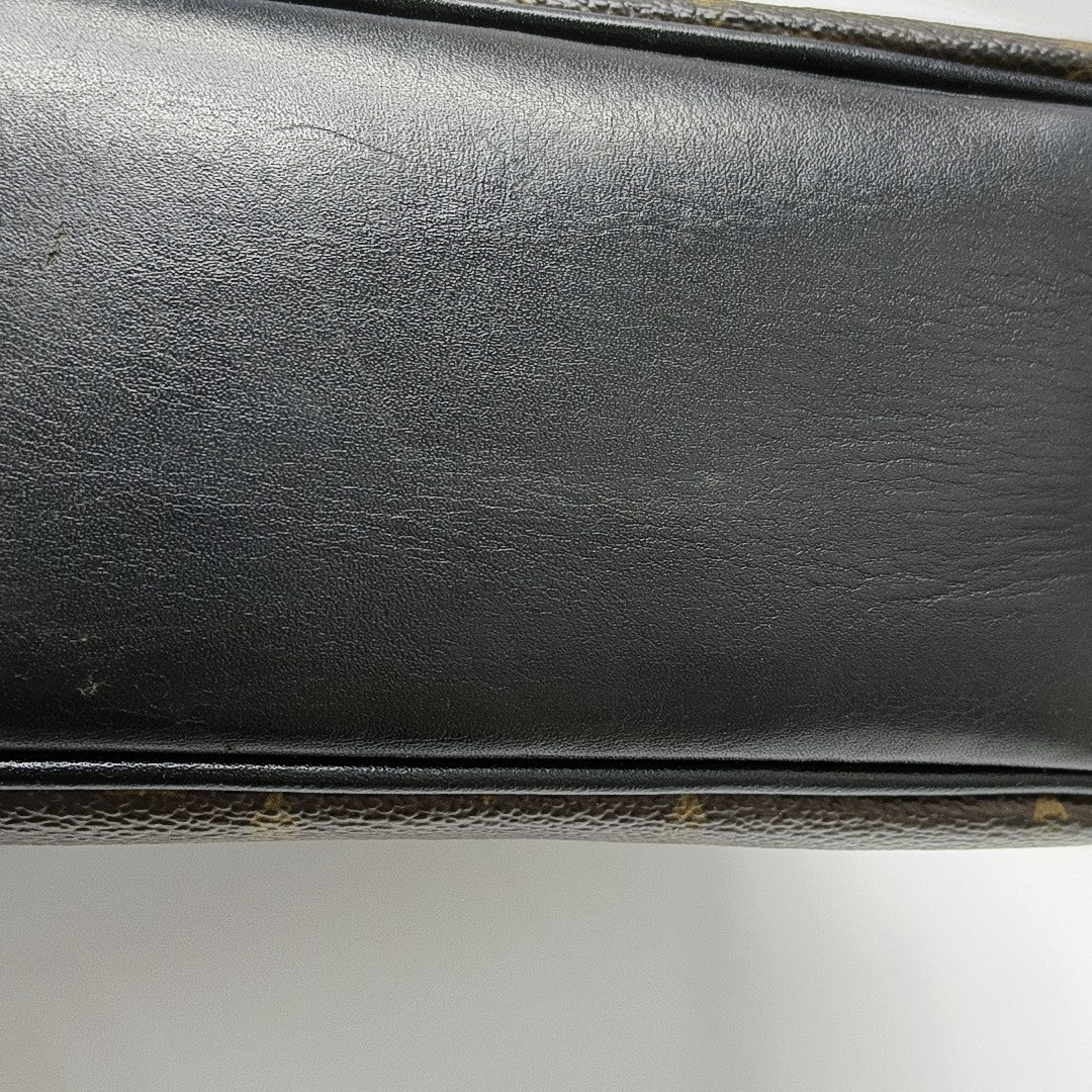 BASS Monogram Coated Canvas Brown