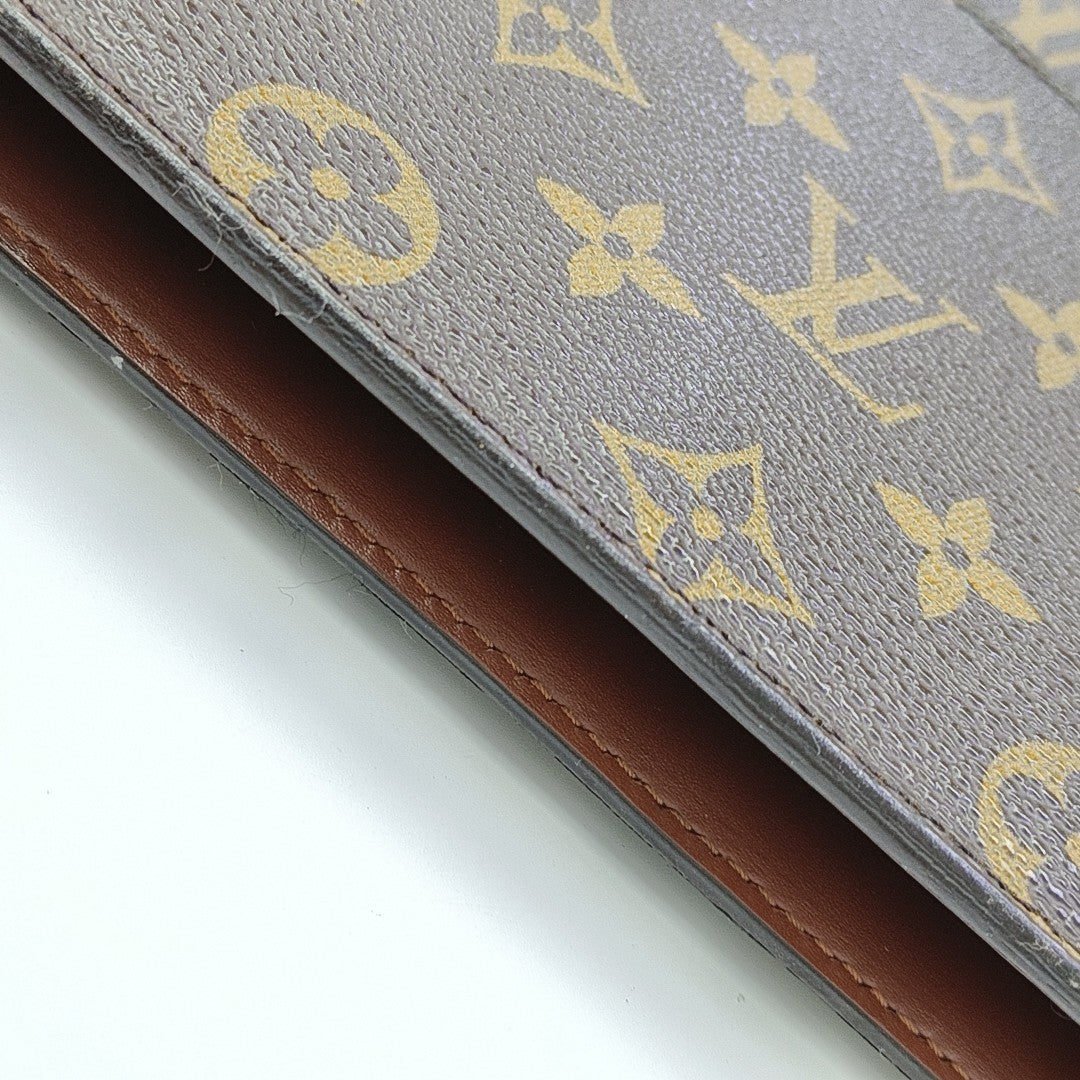 Monogram Coated Canvas Clutch Brown