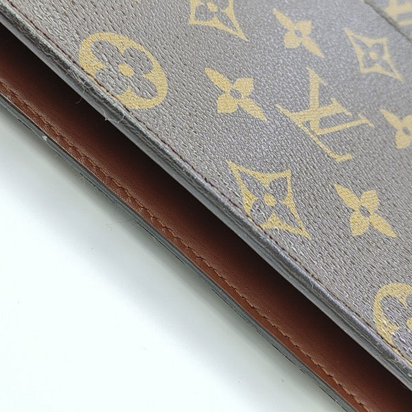 Monogram Coated Canvas Clutch Brown