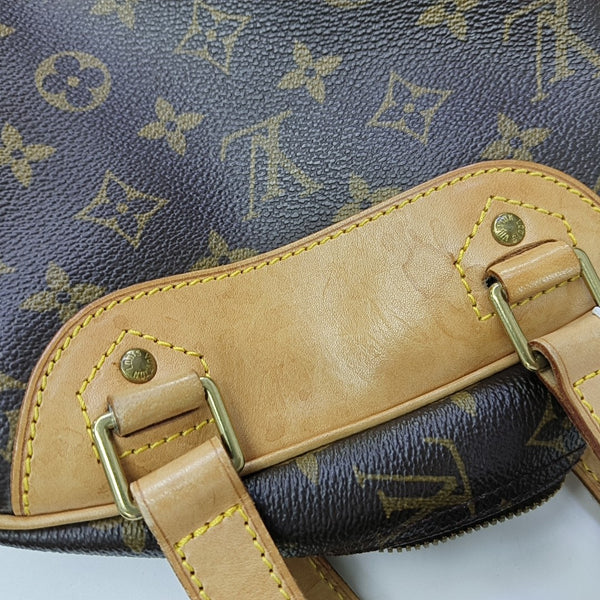EXCURSION Monogram Coated Canvas Brown