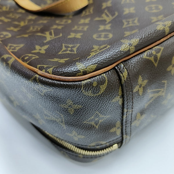 EXCURSION Monogram Coated Canvas Brown