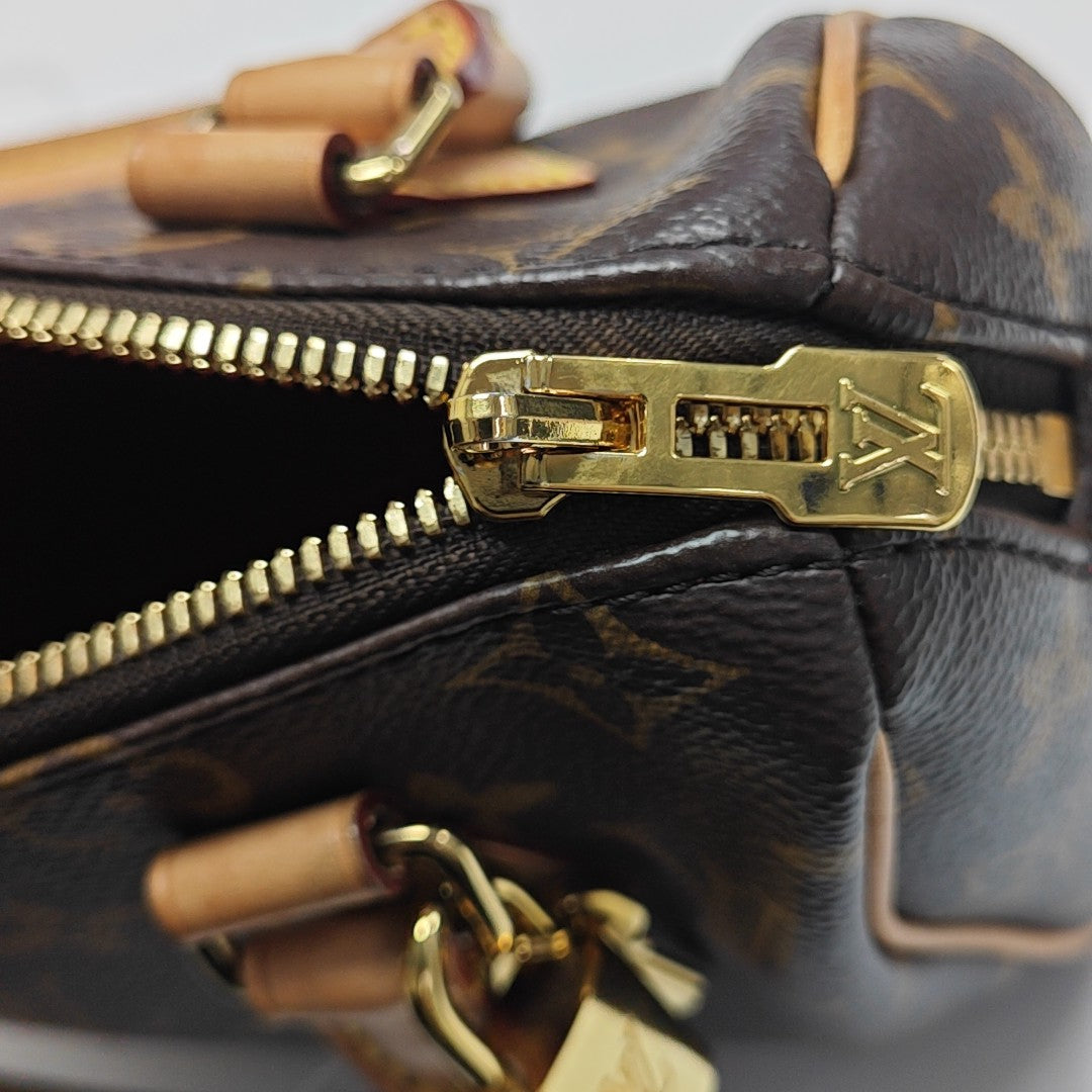 SPEEDY 20 Monogram Coated Canvas Brown