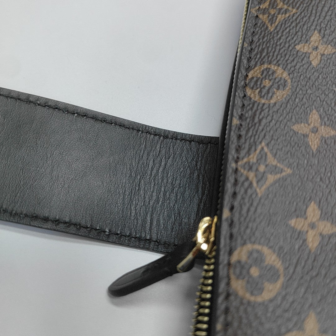 TRUNK Monogram Coated Canvas Brown