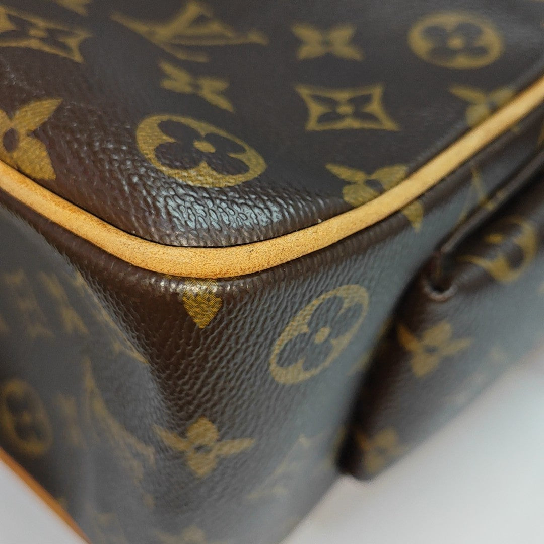 MULTIPLE Monogram Coated Canvas Brown