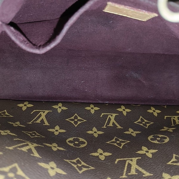 MONTAIGNE GM Monogram Coated Canvas Brown