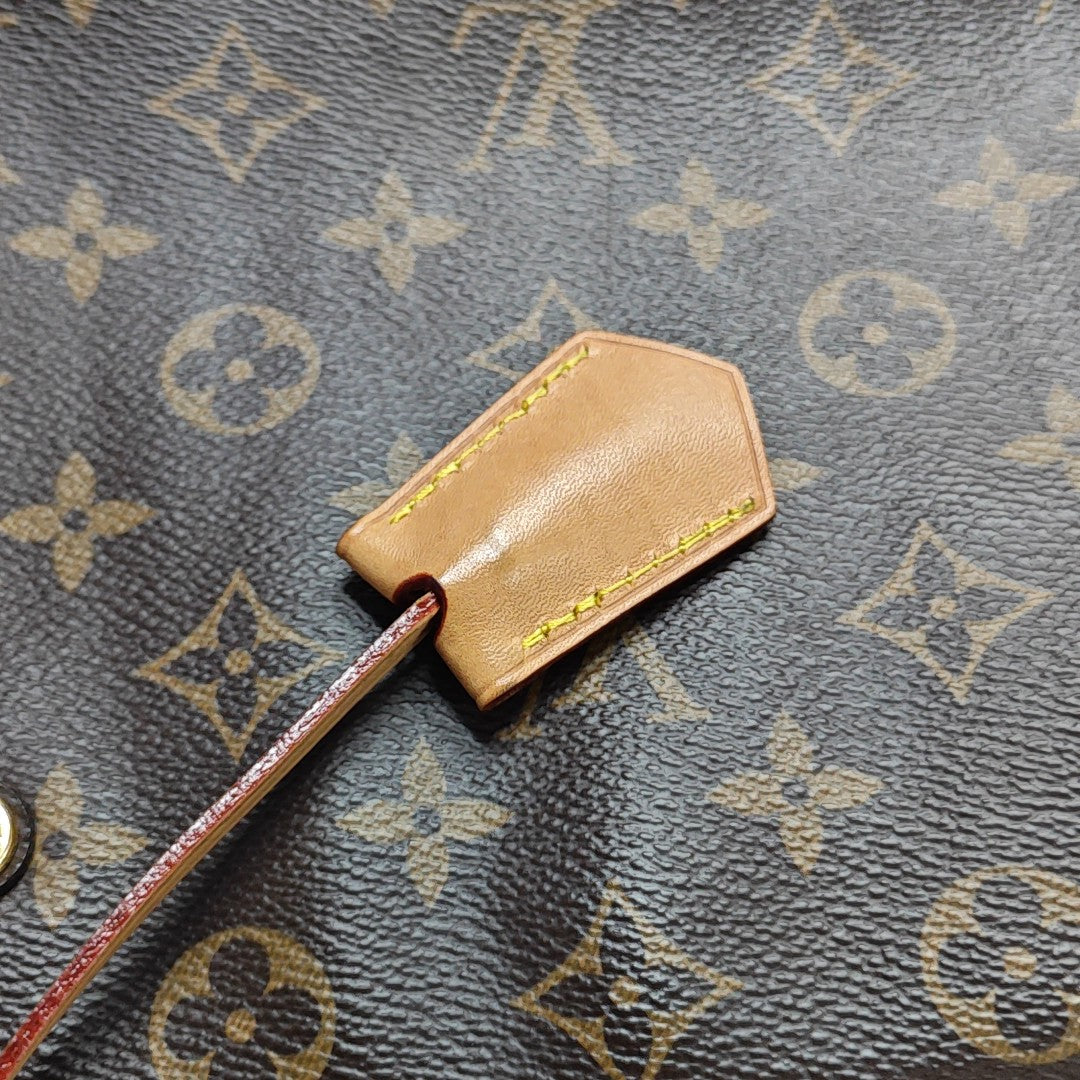 MONTAIGNE Monogram Coated Canvas Brown