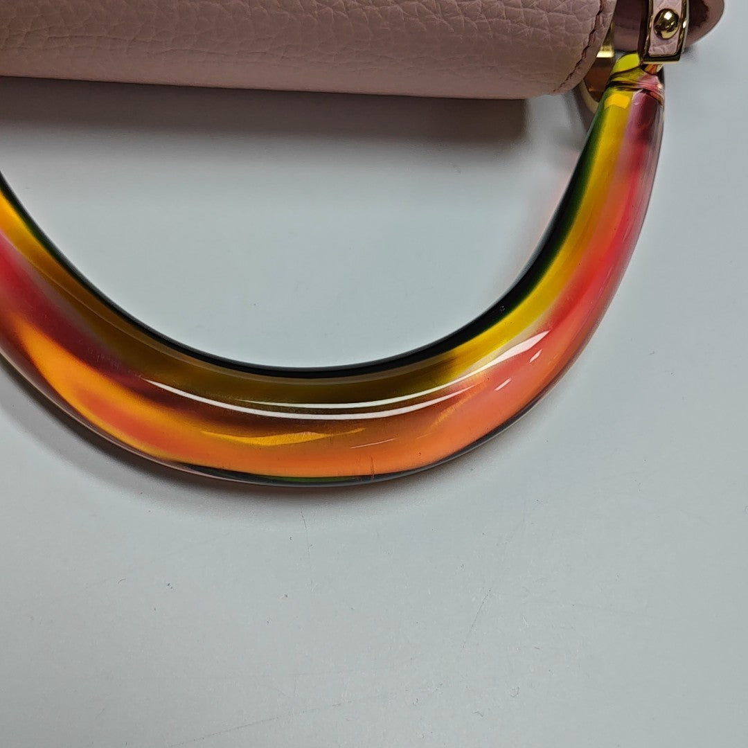 Authenticated pre-owned  CAPUCINES PM Calfskin Pink - Shoulder Bag at Looply