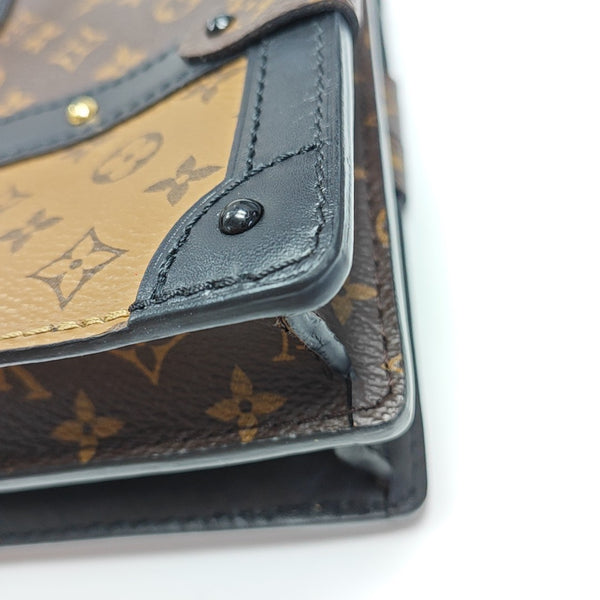 TRUNK Monogram Coated Canvas Brown