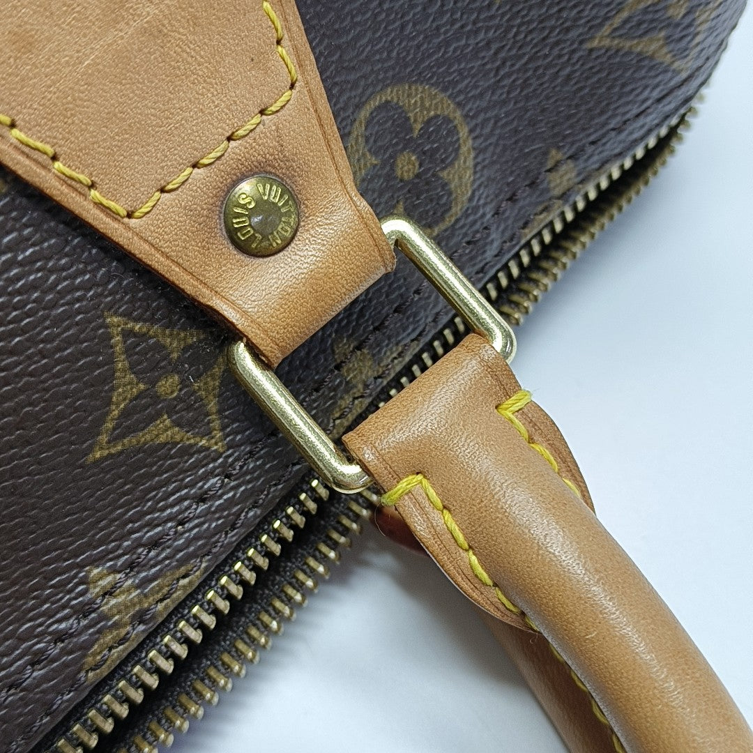 SPEEDY 30 Monogram Coated Canvas Brown